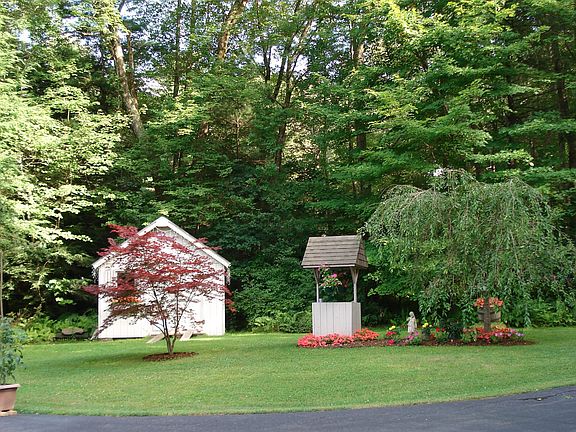 storage shed and wishing well