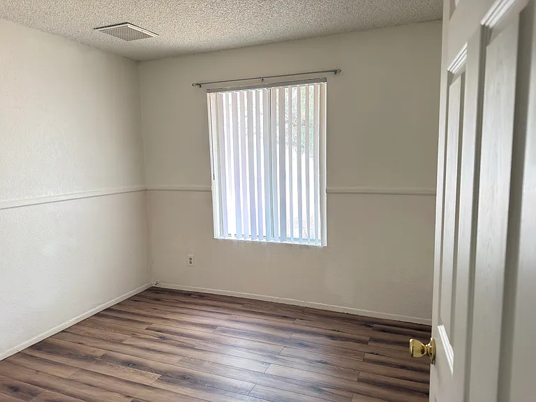 2nd Front bedroom
Does not show new paint or ceilings redone.