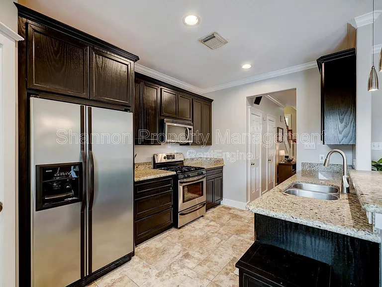 1025 W 15th 1/2 St — Photo 6