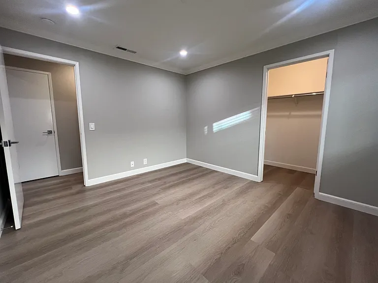 Bedroom with walk in closet