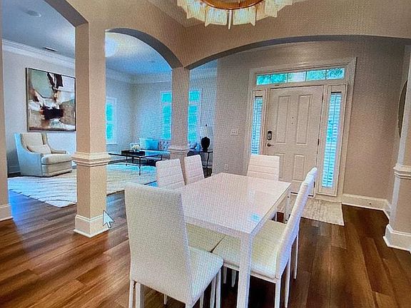 Dining room looking into front and family room.
