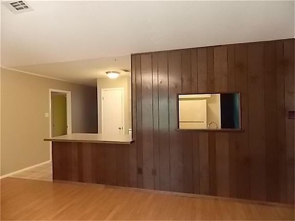 MORE OF THE DEN WITH BREAKFAST BAR AND SERVING WINDOW!