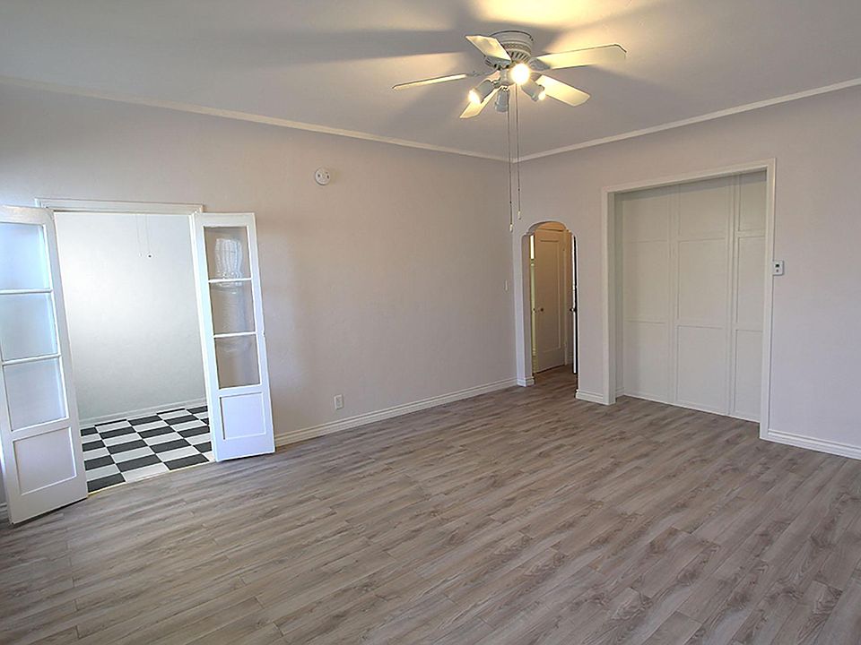 Main Room looking at Kitchen on left and Entry on right.