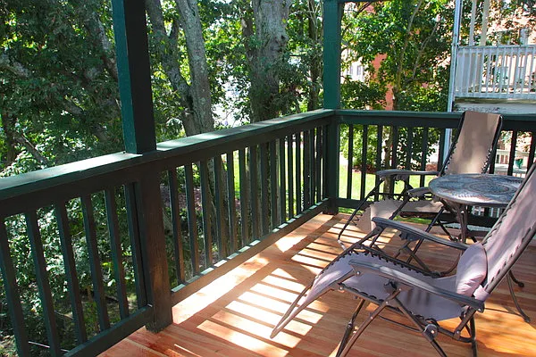 Private back deck for serene chilling or entertaining overlooks landscaped garden