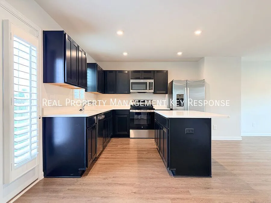 Nearly New 4-Bedroom Home with an Office, Open Floor Plan & 2-Car Garage — Photo 4