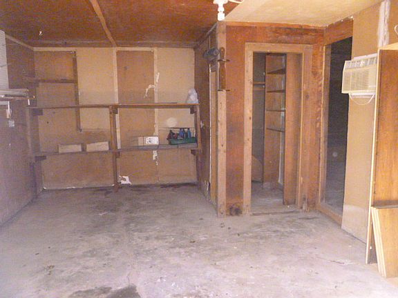 STORAGE AREA BESIDE GARAGE