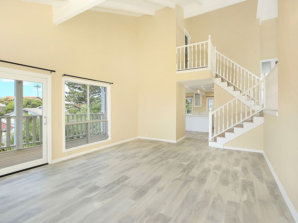 Living room facing towards kitchen/dining room