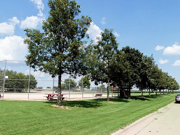 The property is located across the street from a large park.