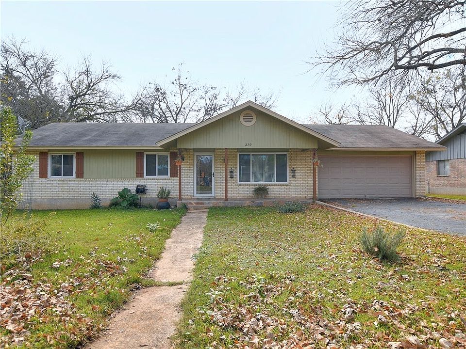 Front before xeriscaping. New picture soon!