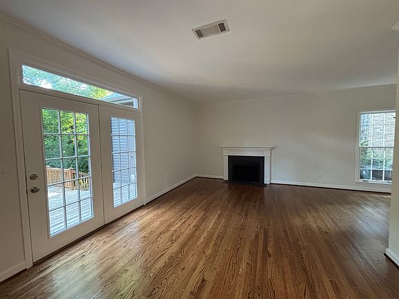 Refinished oak hardwood floors downstairs.