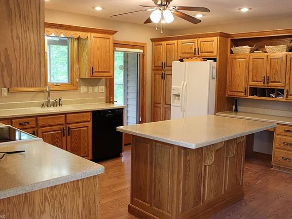 KITCHEN WITH CUSTOM OAK CABINETRY