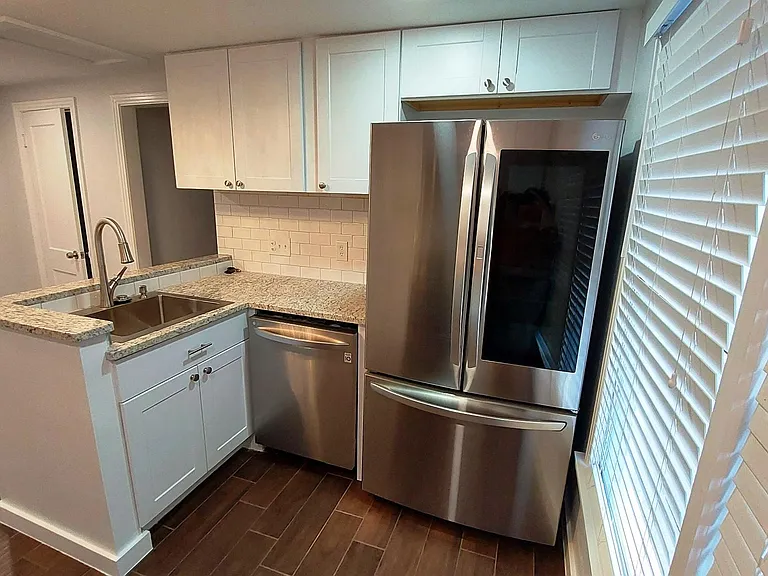 Remodeled this kitchen, with all Stainless steal appliances; Fridge, Dishwasher, Stainless sink.