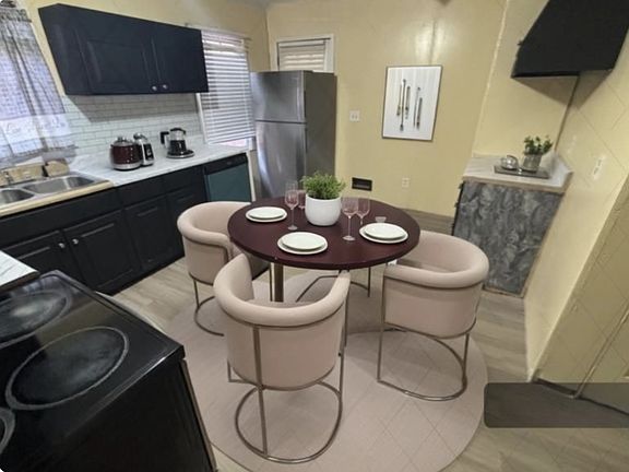 Kitchen - 
TABLE, CHAIRS, AND COFFEE POT ARE NOT INCLUDED