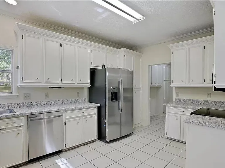 NEW appliances. Refrigerator, dishwasher, stove/oven, microwave. 
Lots of cabinets!