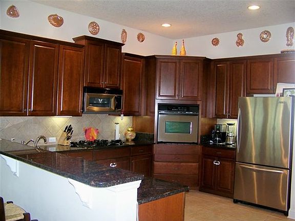 Gourmet kitchen with granite and stainless