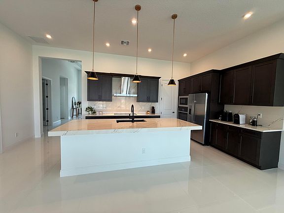 3rd image of 8490 SW Cantante Way
