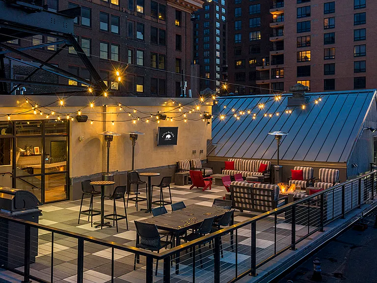 Rooftop Patio with firepit and big screen TV