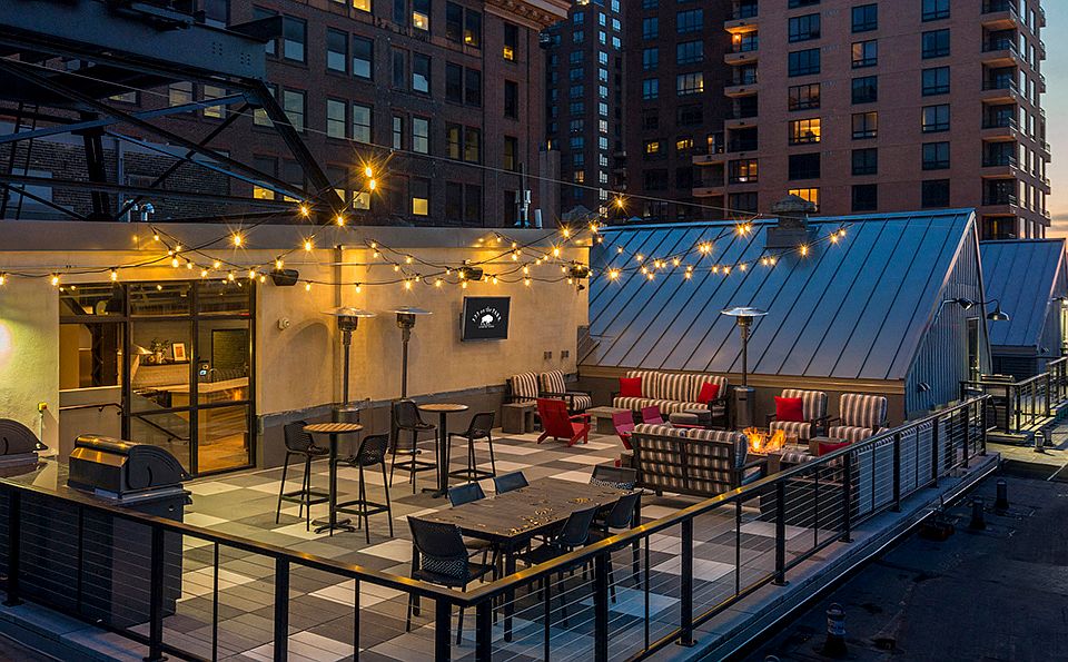 Rooftop Patio with firepit and big screen TV