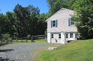 lower driveway entrance to house and bac