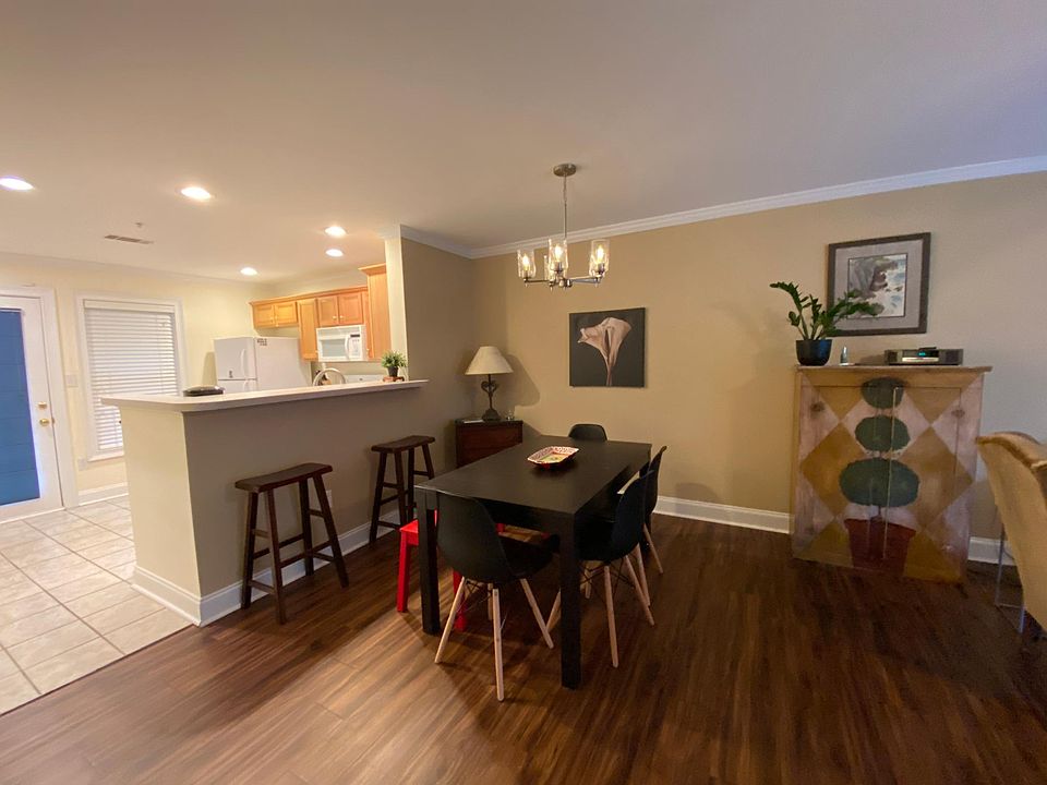 Dining area and bar overlooking kitchen.