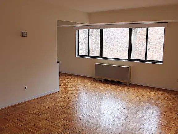 Hardwood floors and panoramic views of the forest