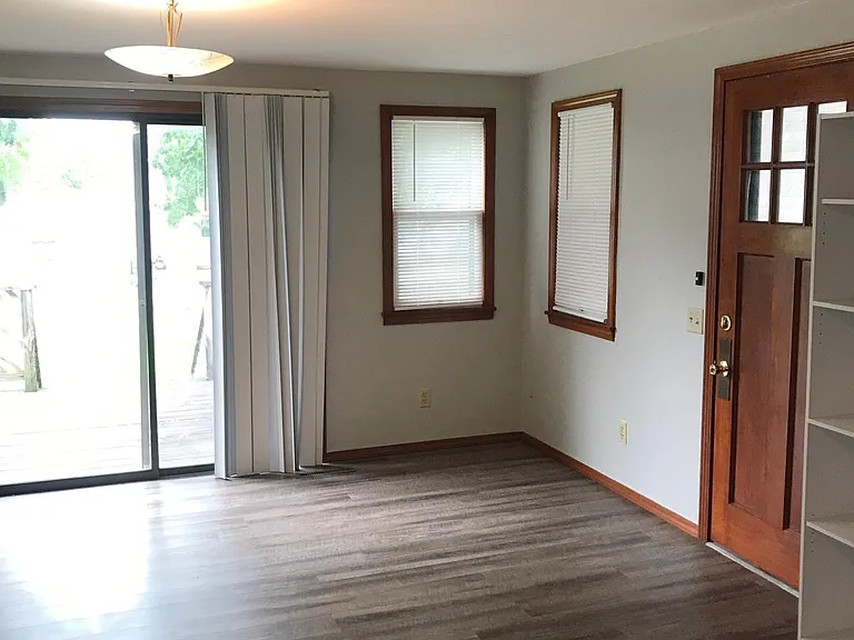 Dining room w/ access to Deck through sliding glass door.