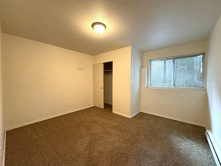 Bedroom with newer carpet