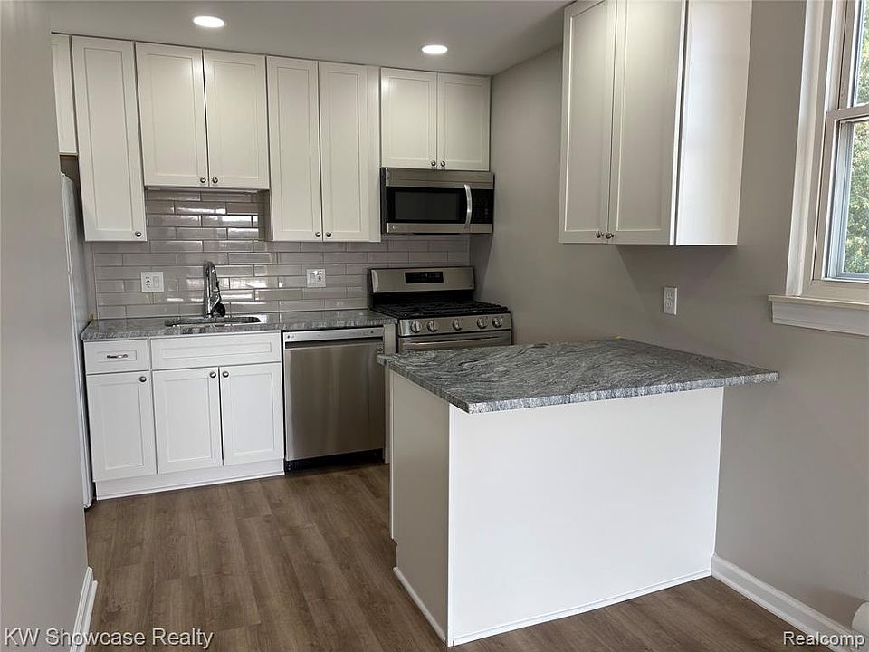 Newly remodeled kitchen with granite counters