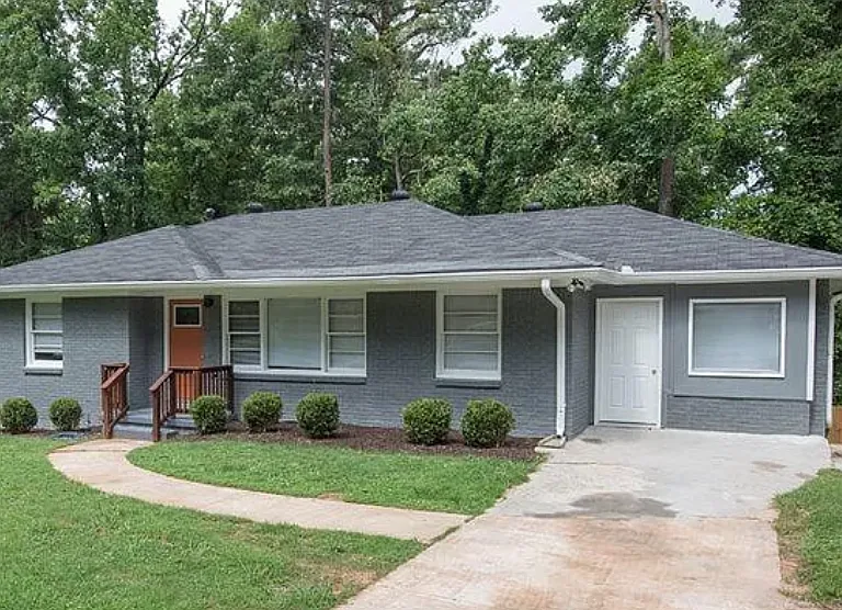 1955 ranch has great windows, original beautiful hardwood floors, and large front and back yards