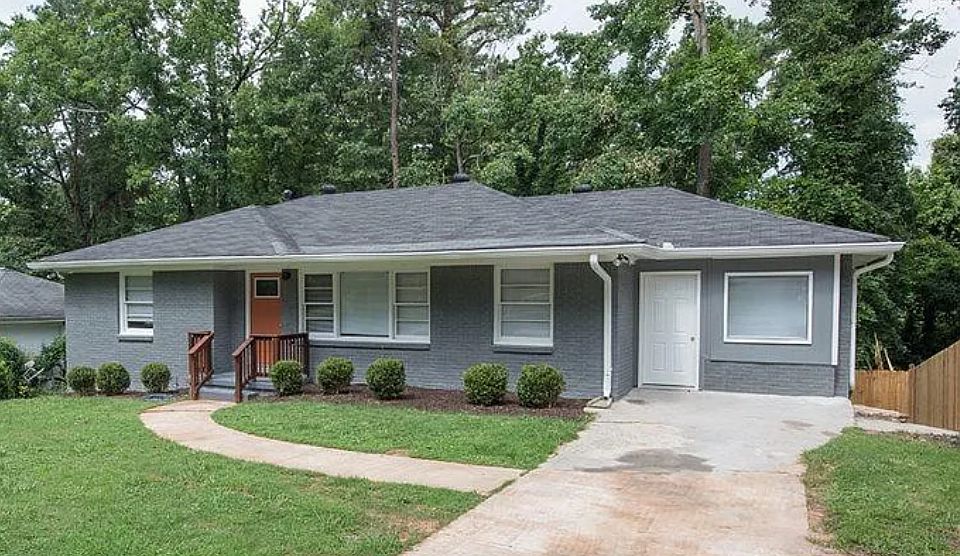 1955 ranch has great windows, original beautiful hardwood floors, and large front and back yards