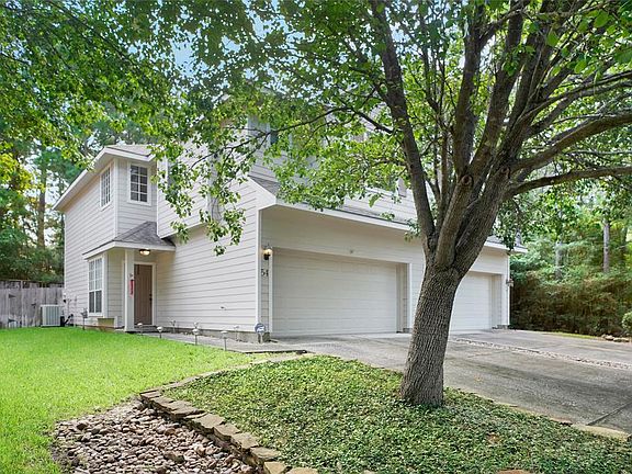 Welcome home to 54 Leafstalk Court, an extremely well maintained, cozy townhome in The Woodlands, Alden Bridge.