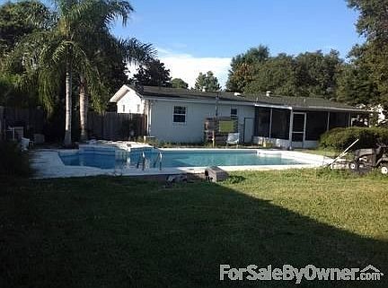 Back yard view - pool and screened porch
