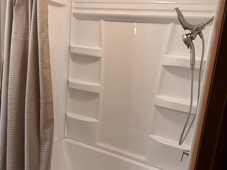 Tub shower. New.