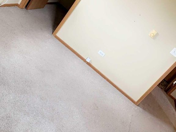Inside bedroom looking towards hallway and closet.