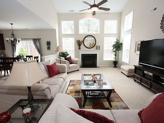 The large, 2 story family room offers lots of natural light.