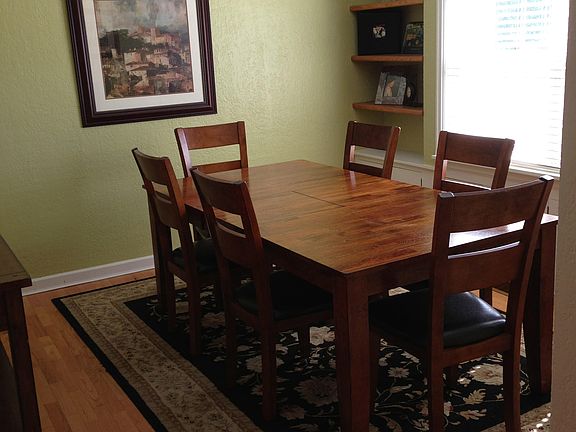 Dining room. See other photo without furnishings for fresh paint color.