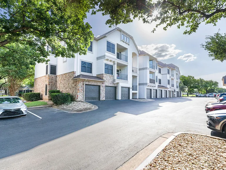 Private garages and tree-lined views bring added ease to your everyday at Alister Sunset Valley.