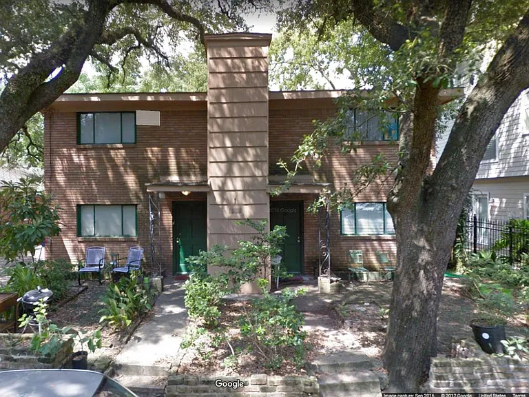 8 Plex with 4 in front building and 4 in back.