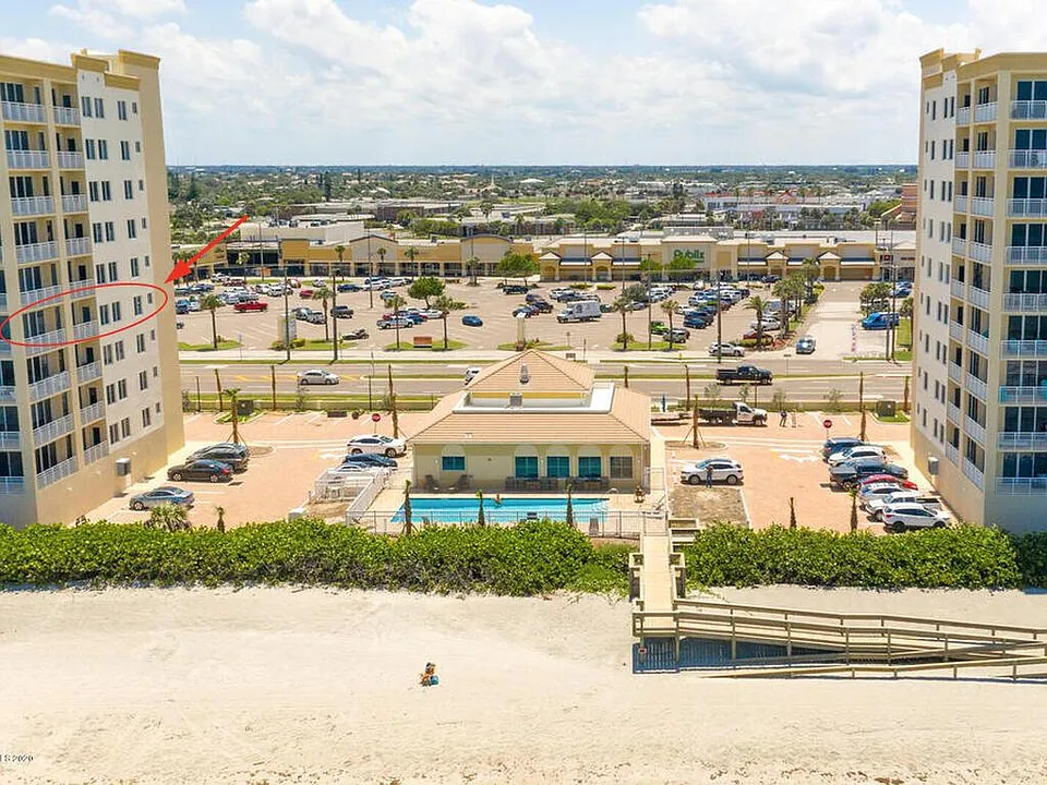 view looking west.
Two towers with clubhouse and heated pool
Prime location with convenient Shopping Center and Grocery Store (Publix) across the street
