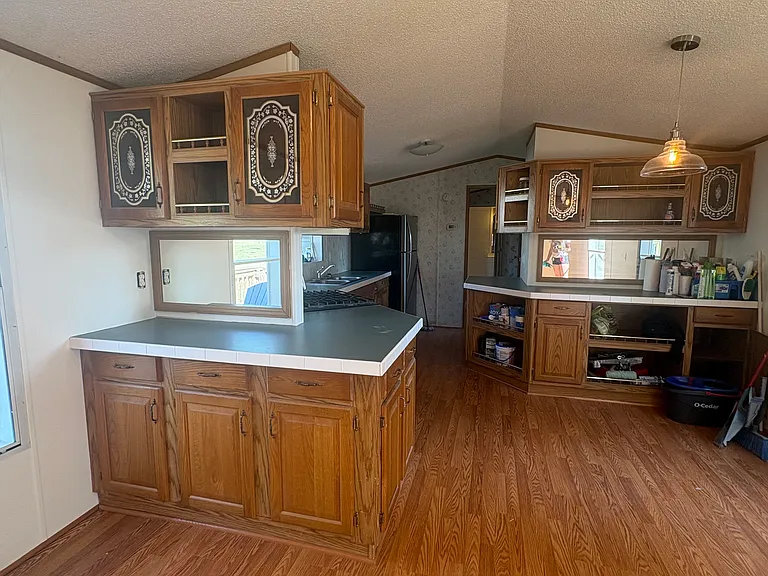 Kitchen with open concept living room