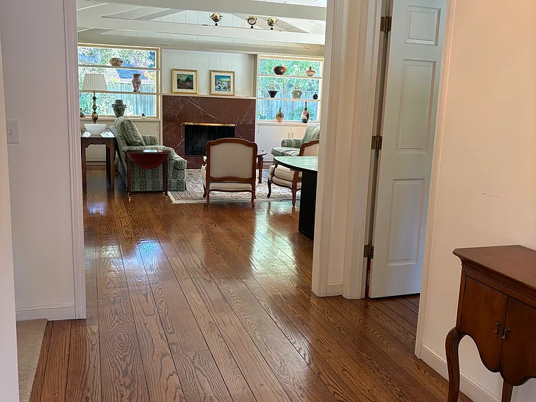 Entry opens to living/dining room, kitchen and hallway