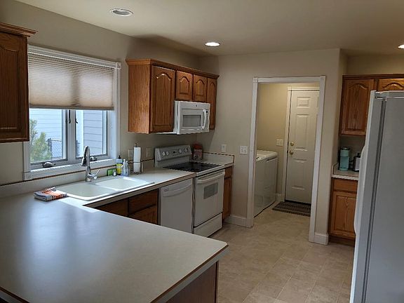 Kitchen looking into laundry room.