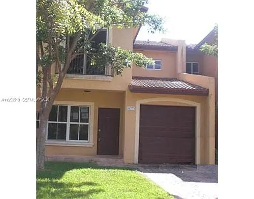 875 SW 6th Pl #TOWNHOUSE Photo 1
