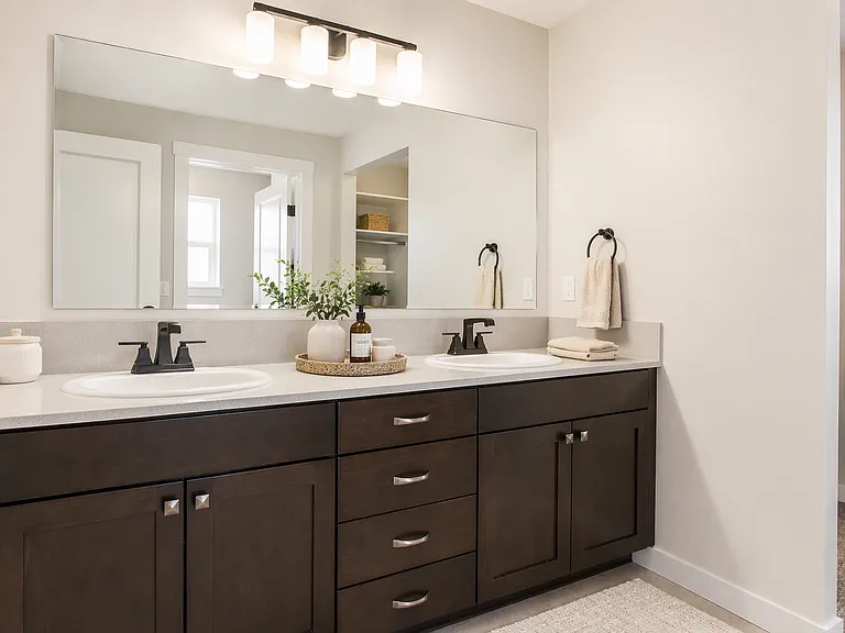 Primary bathroom with dual vanities