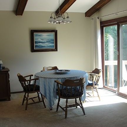 Vaulted,beamed dining rm