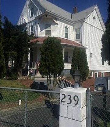 Front, parking for apt 2