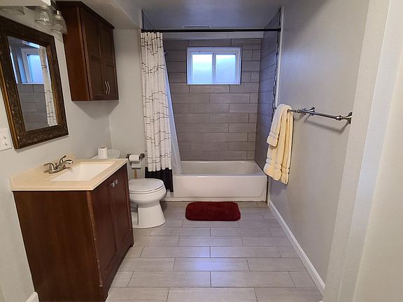 Huge. Bigger and nicer than the owner's. Shower and tub. Room for a vanity, makeup table, mobile wardrobe closet, bidet, etc.