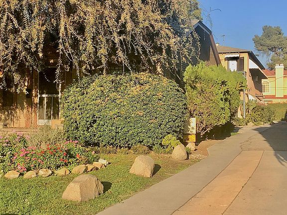 Long driveway leads to apartment and parking
