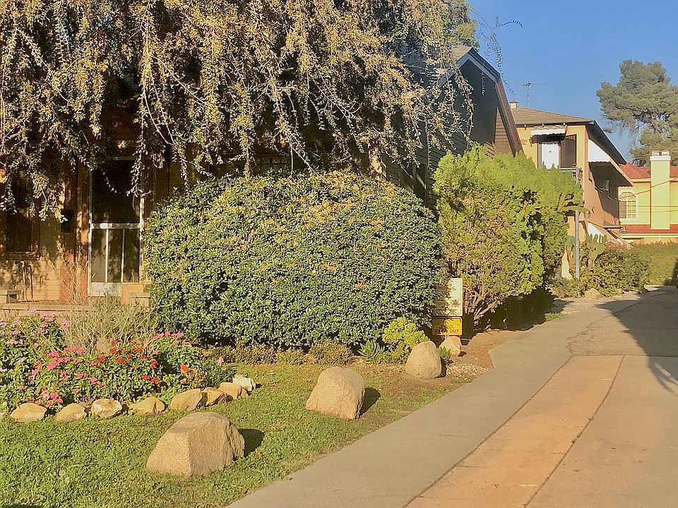 Long driveway leads to apartment and parking