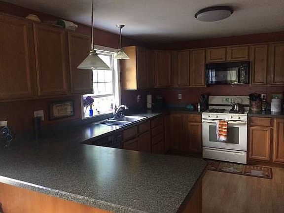 Huge kitchen opens to DR 